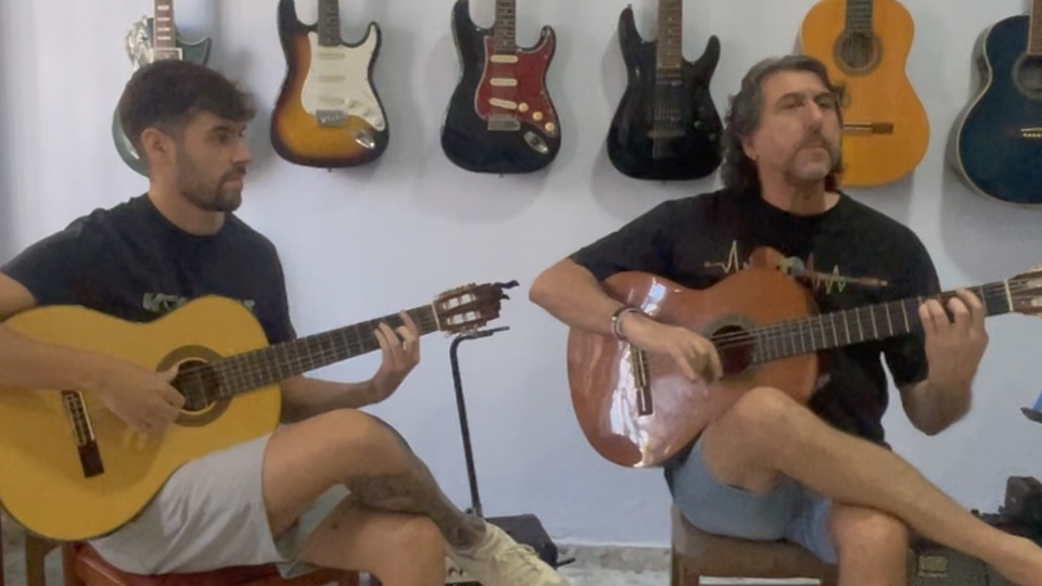 Antonio and Diego playing flamenco guitars together in Utrera.